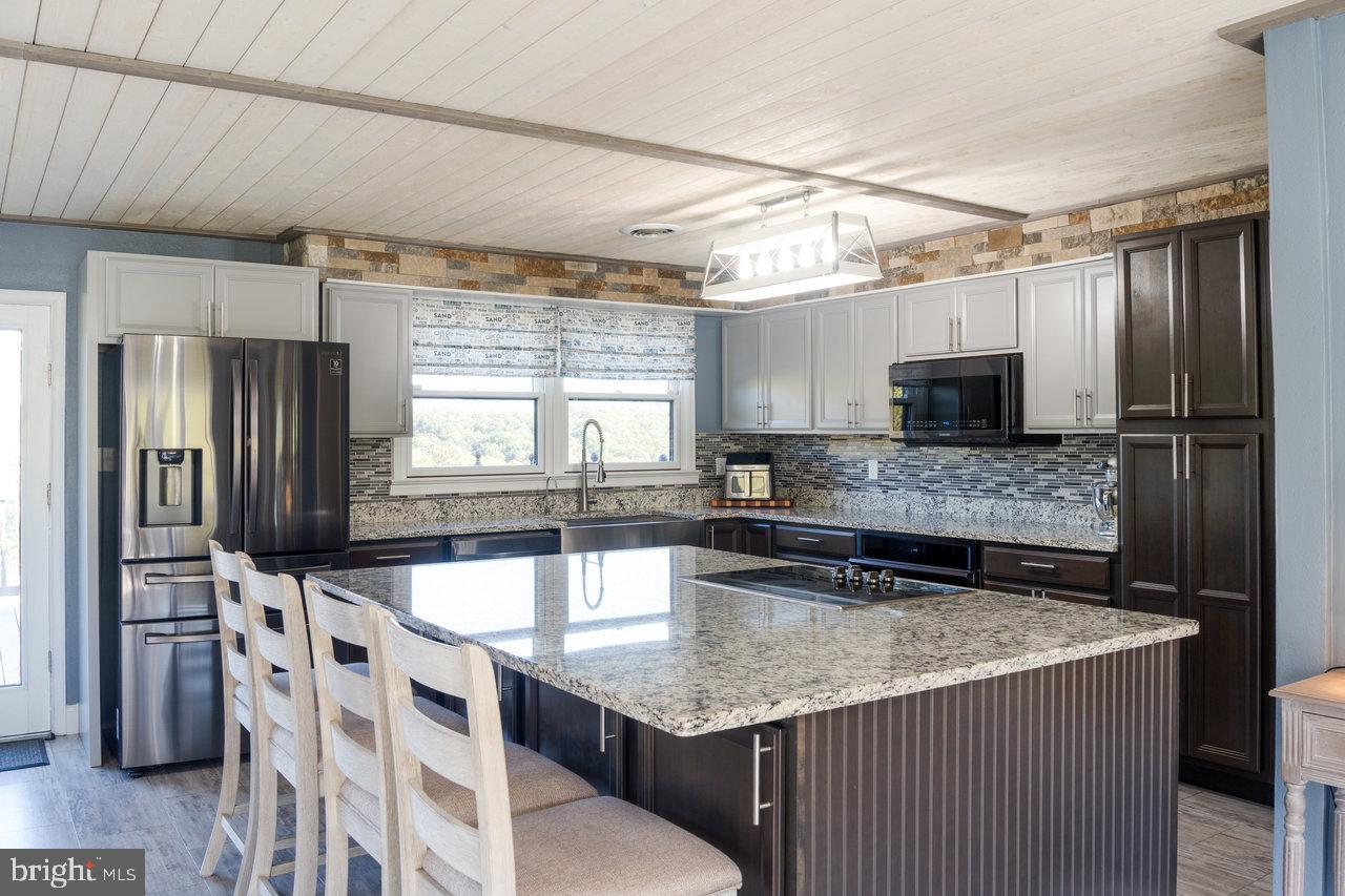 212 Whitacre Road Gore, VA 22637 - Photo 2 of 100 Modern kitchen with elegant finishes.