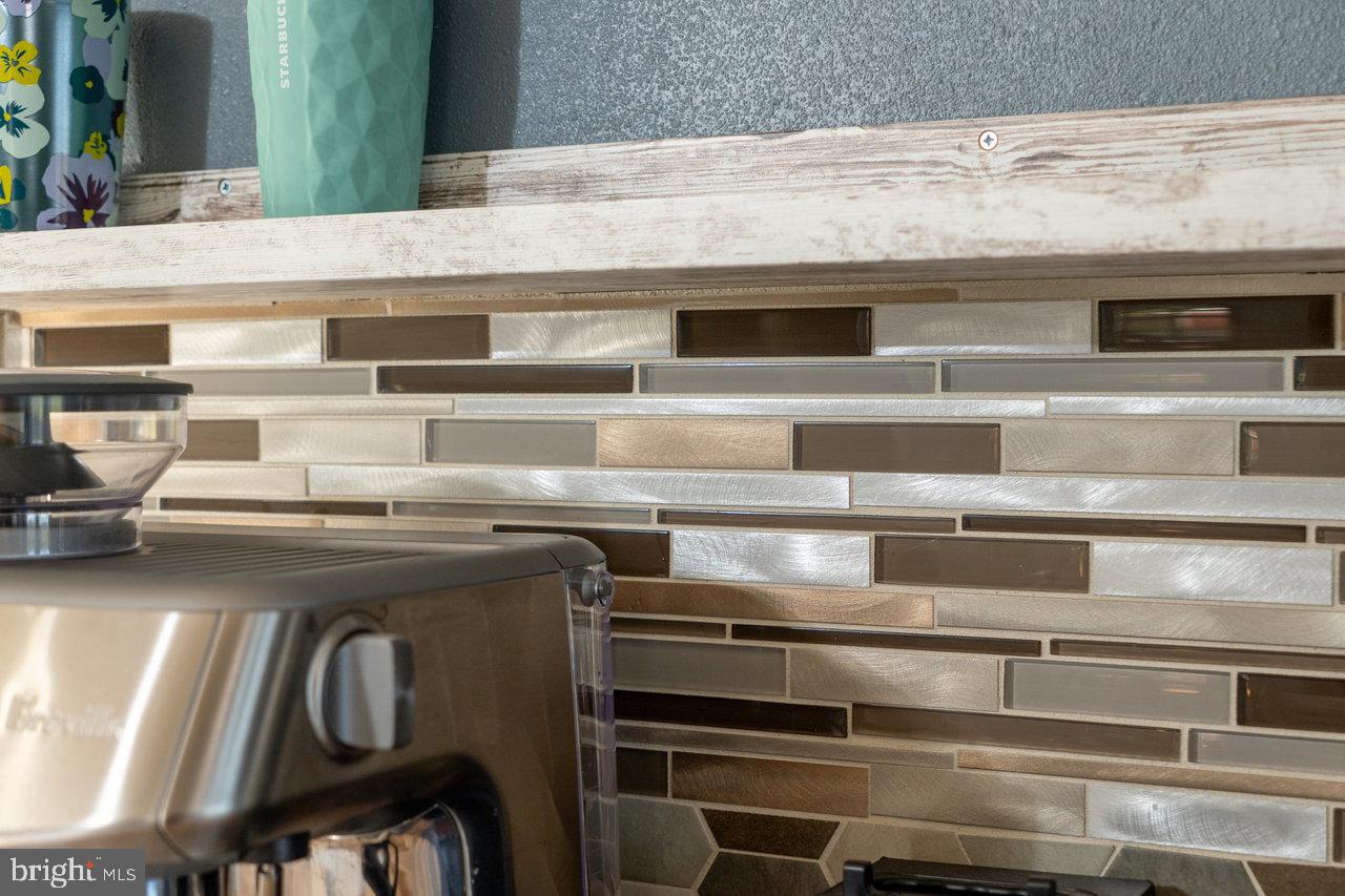 212 Whitacre Road Gore, VA 22637 - Photo 34 of 100 Sleek kitchen backsplash with modern tiles.