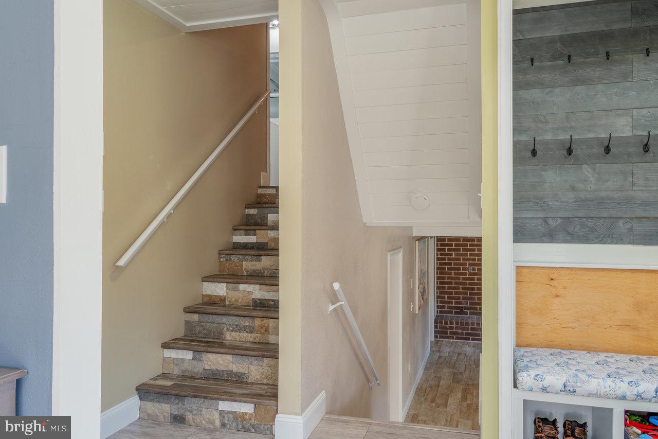 212 Whitacre Road Gore, VA 22637 - Photo 37 of 100 a view of staircase with white walls and windows