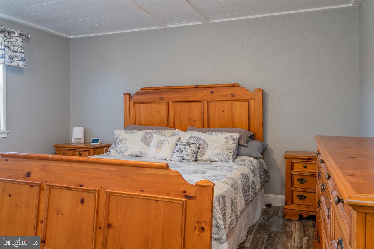 212 Whitacre Road Gore, VA 22637 - Photo 40 of 100 Cozy wooden bedroom with serene ambiance.
