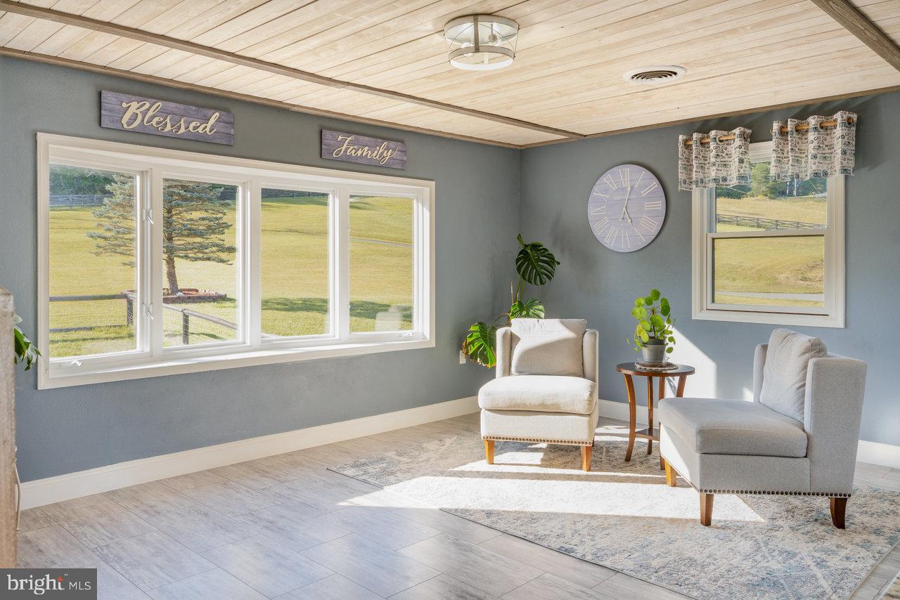 212 Whitacre Road Gore, VA 22637 - Photo 4 of 100 a living room with furniture and a window