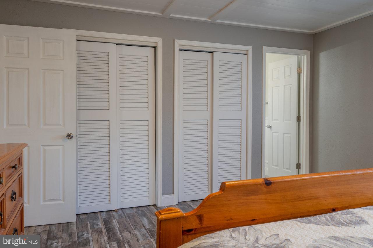 212 Whitacre Road Gore, VA 22637 - Photo 42 of 100 a bedroom with a bed and a window