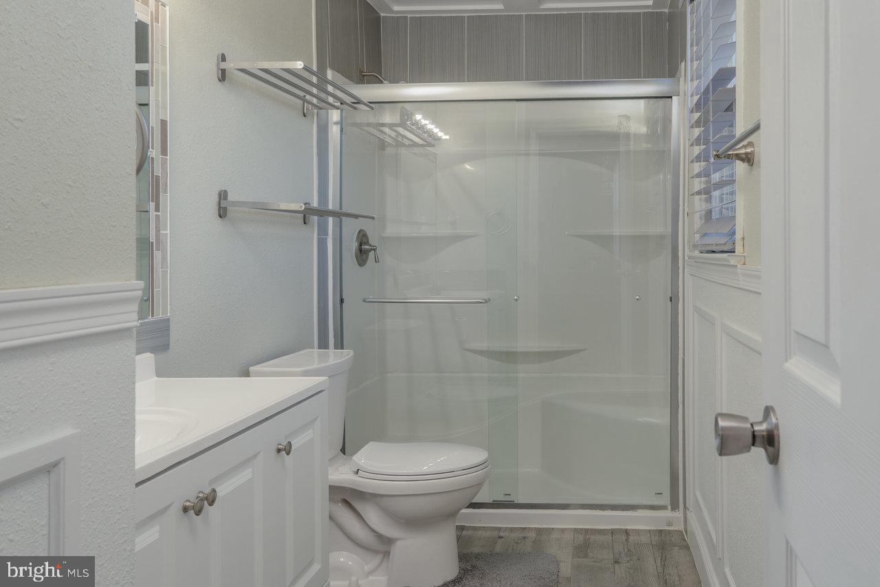 212 Whitacre Road Gore, VA 22637 - Photo 43 of 100 a bathroom with a shower and a toilet