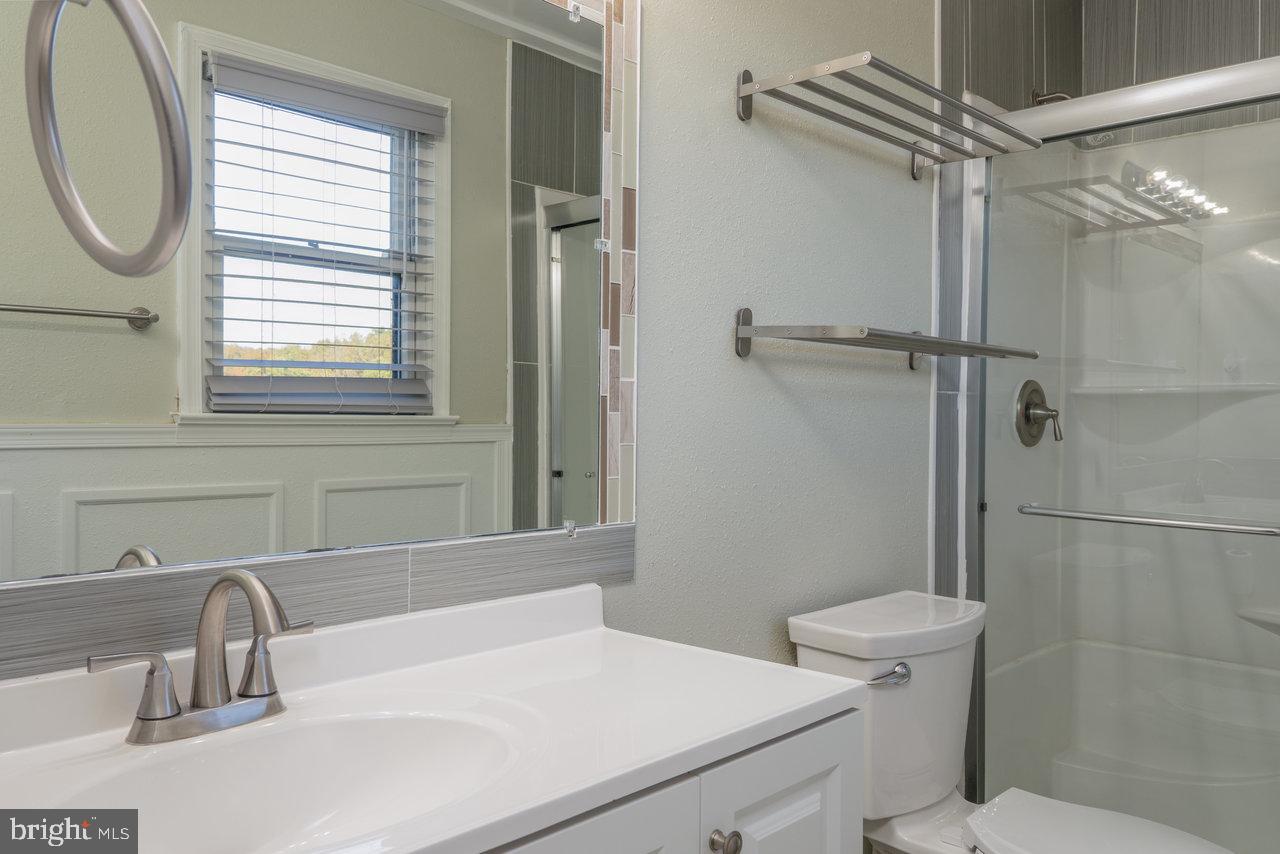 212 Whitacre Road Gore, VA 22637 - Photo 44 of 100 a bathroom with a sink and a toilet