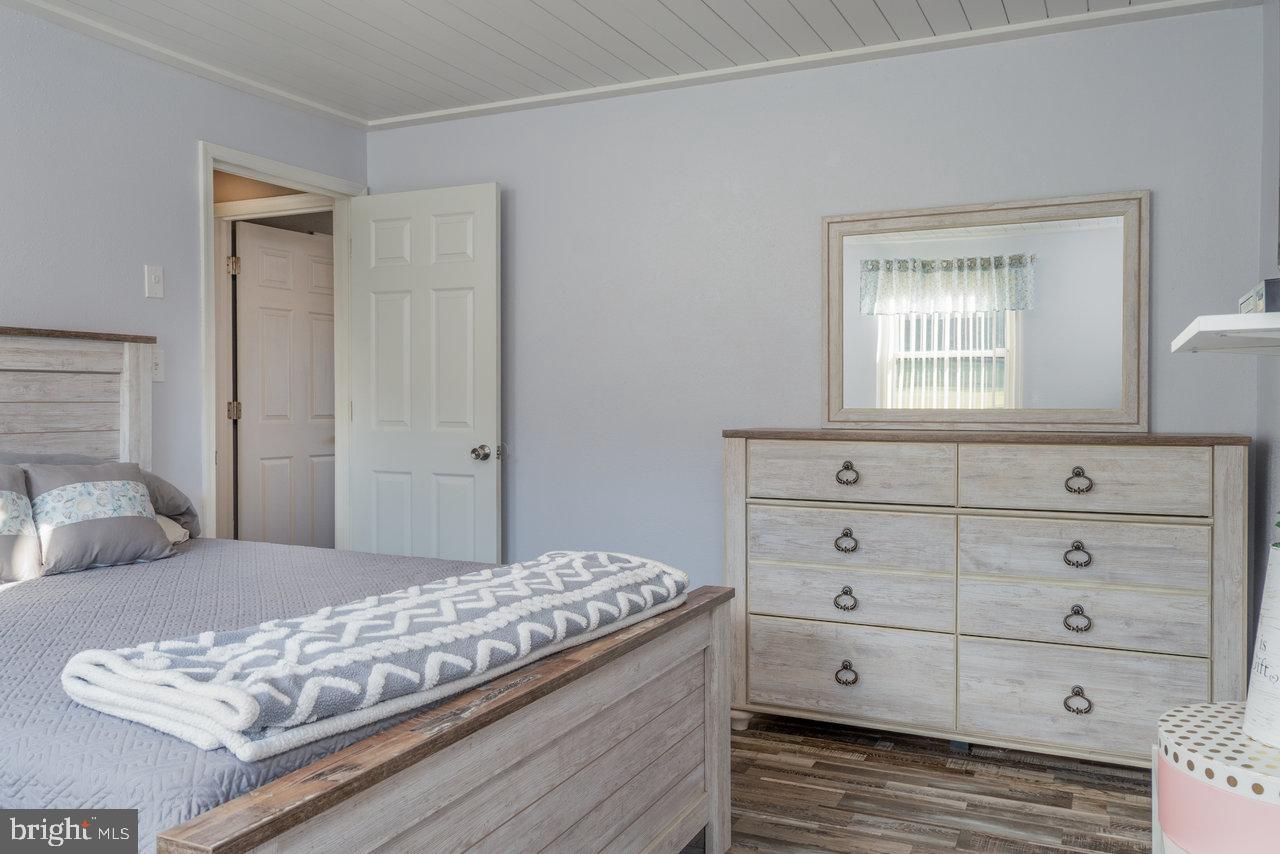 212 Whitacre Road Gore, VA 22637 - Photo 47 of 100 a bedroom with a bed and a window