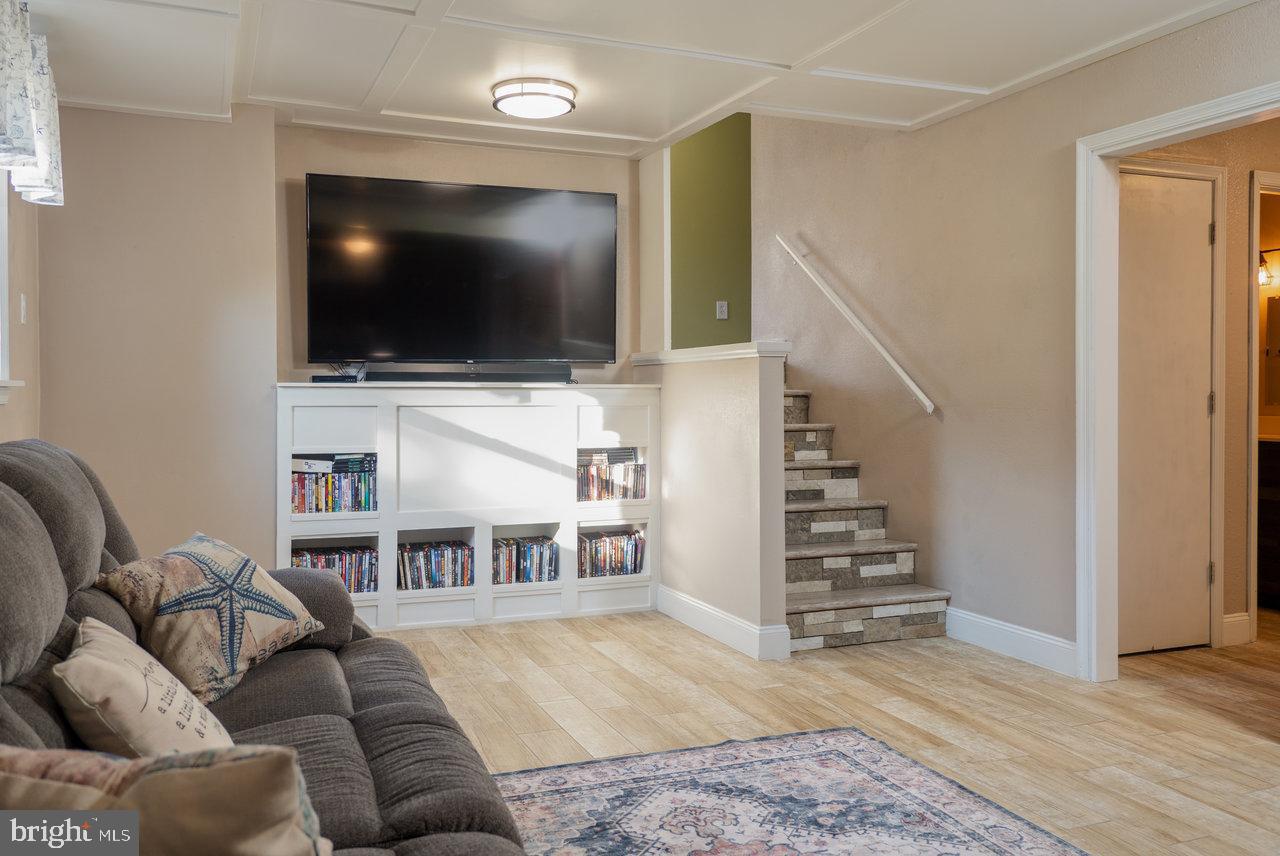 212 Whitacre Road Gore, VA 22637 - Photo 5 of 100 a living room with furniture and a flat screen tv