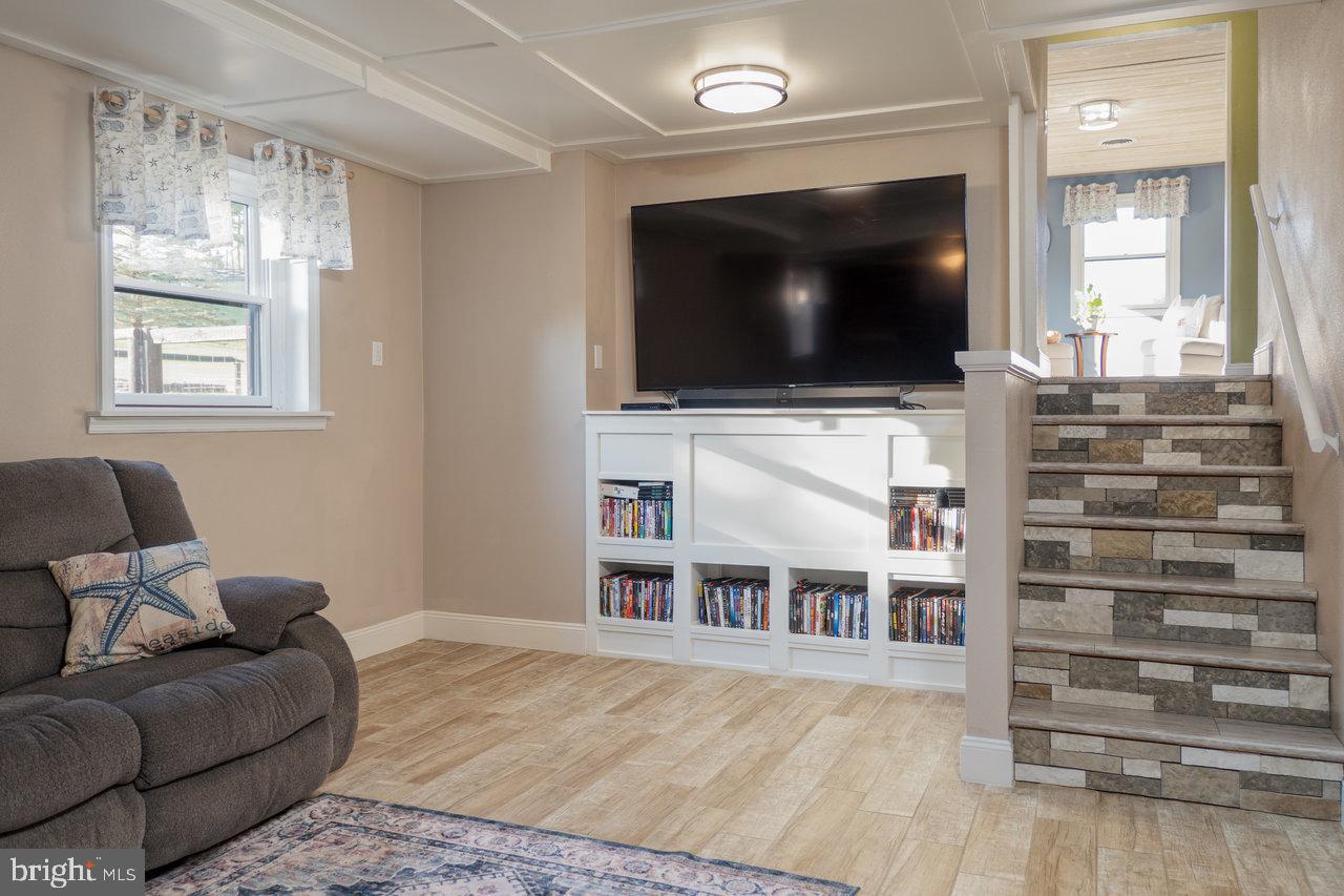 212 Whitacre Road Gore, VA 22637 - Photo 53 of 100 a living room with furniture and a flat screen tv