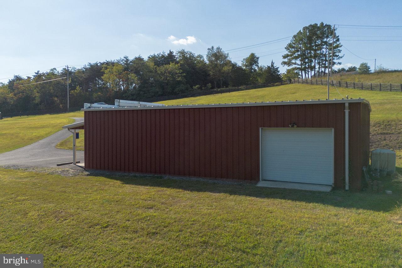 212 Whitacre Road Gore, VA 22637 - Photo 78 of 100 Charming red barn on a serene hillside.