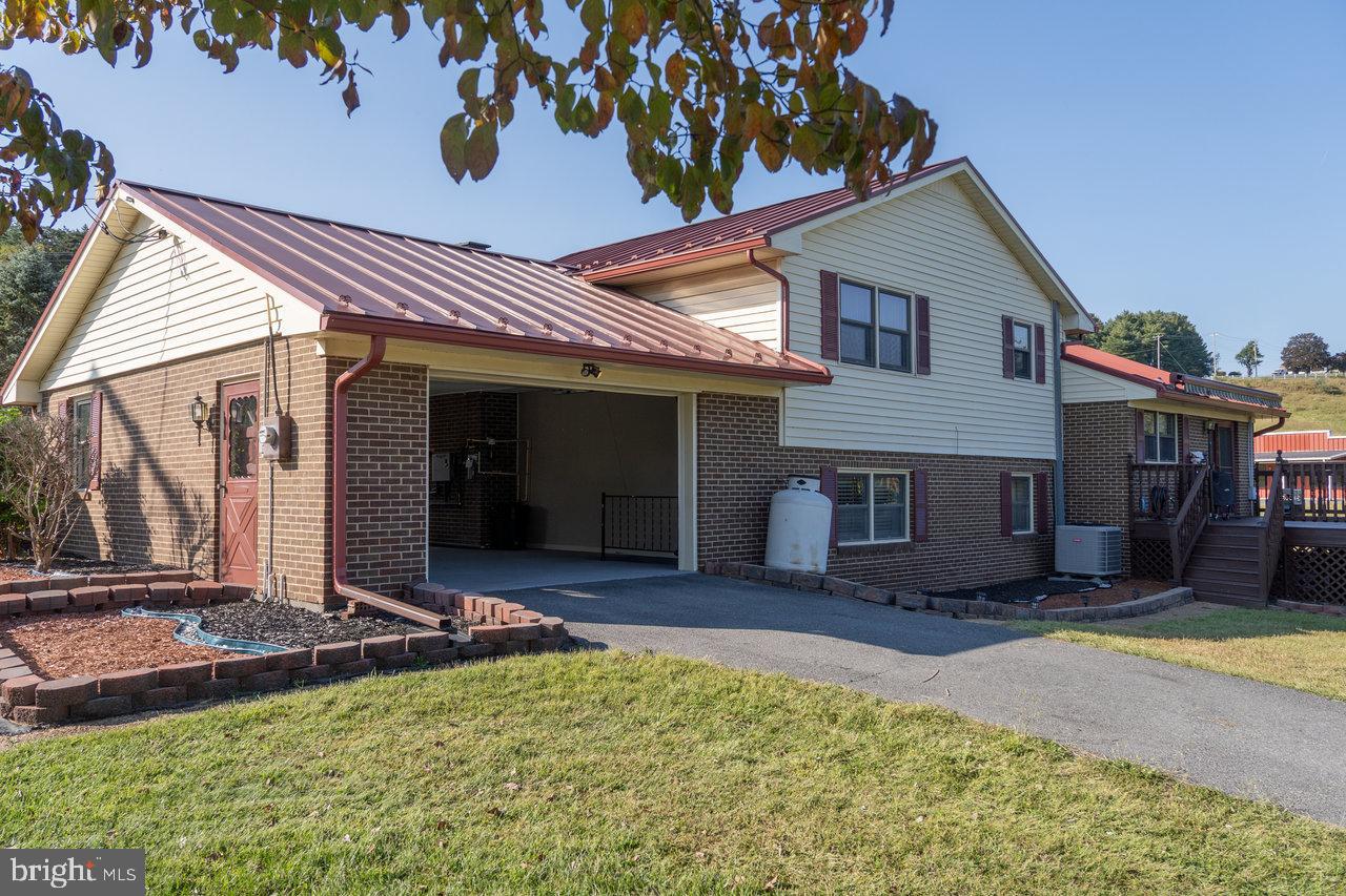 212 Whitacre Road Gore, VA 22637 - Photo 80 of 100 a view of a house with yard and sitting area