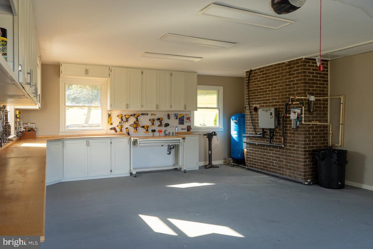 212 Whitacre Road Gore, VA 22637 - Photo 84 of 100 Spacious garage with ample workspace.