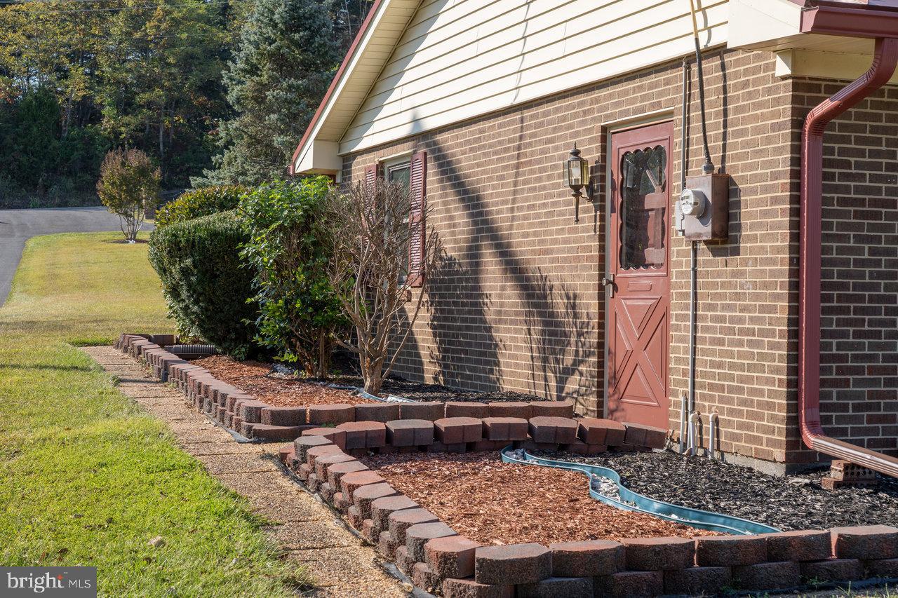 212 Whitacre Road Gore, VA 22637 - Photo 85 of 100 a view of a house with backyard and sitting area