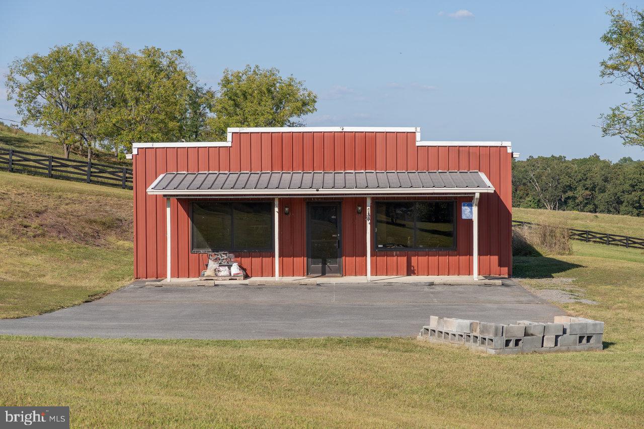 212 Whitacre Road Gore, VA 22637 - Photo 90 of 100 a front view of a house with a garden
