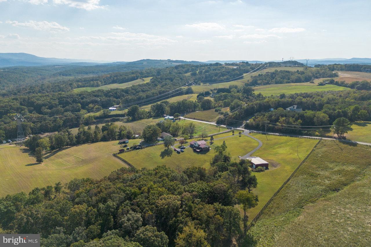 212 Whitacre Road Gore, VA 22637 - Photo 96 of 100 a view of a lake with a mountain in the background