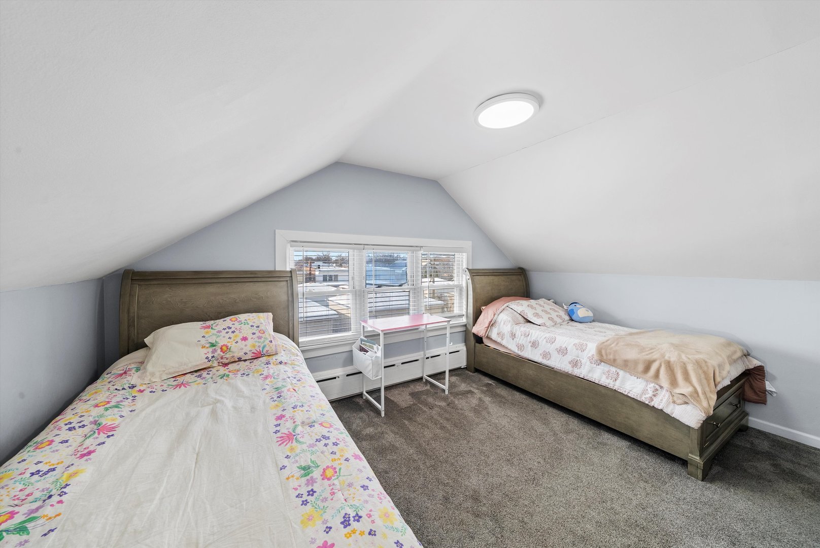 2716 Grove Avenue Berwyn, IL 60402 - Photo 19 of 46 a bedroom with a bed and a window