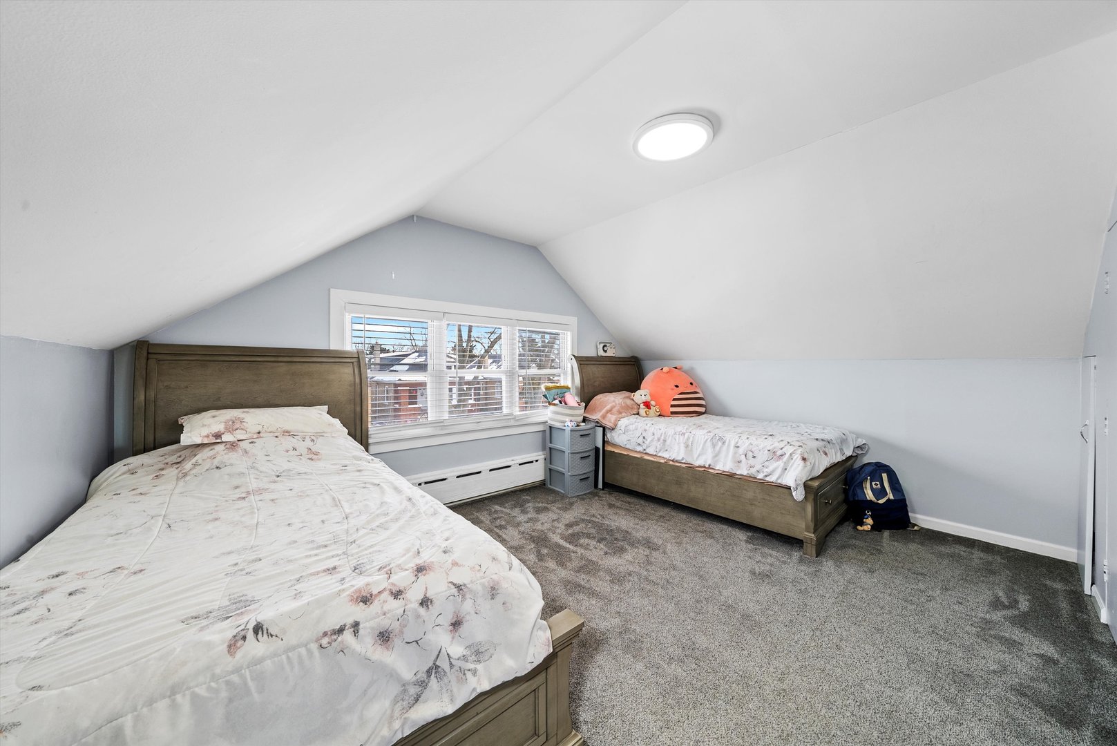 2716 Grove Avenue Berwyn, IL 60402 - Photo 20 of 46 a bedroom with a bed and a large window