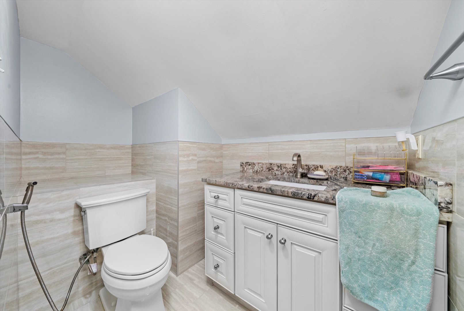 2716 Grove Avenue Berwyn, IL 60402 - Photo 21 of 46 a bathroom with a granite countertop toilet sink and mirror