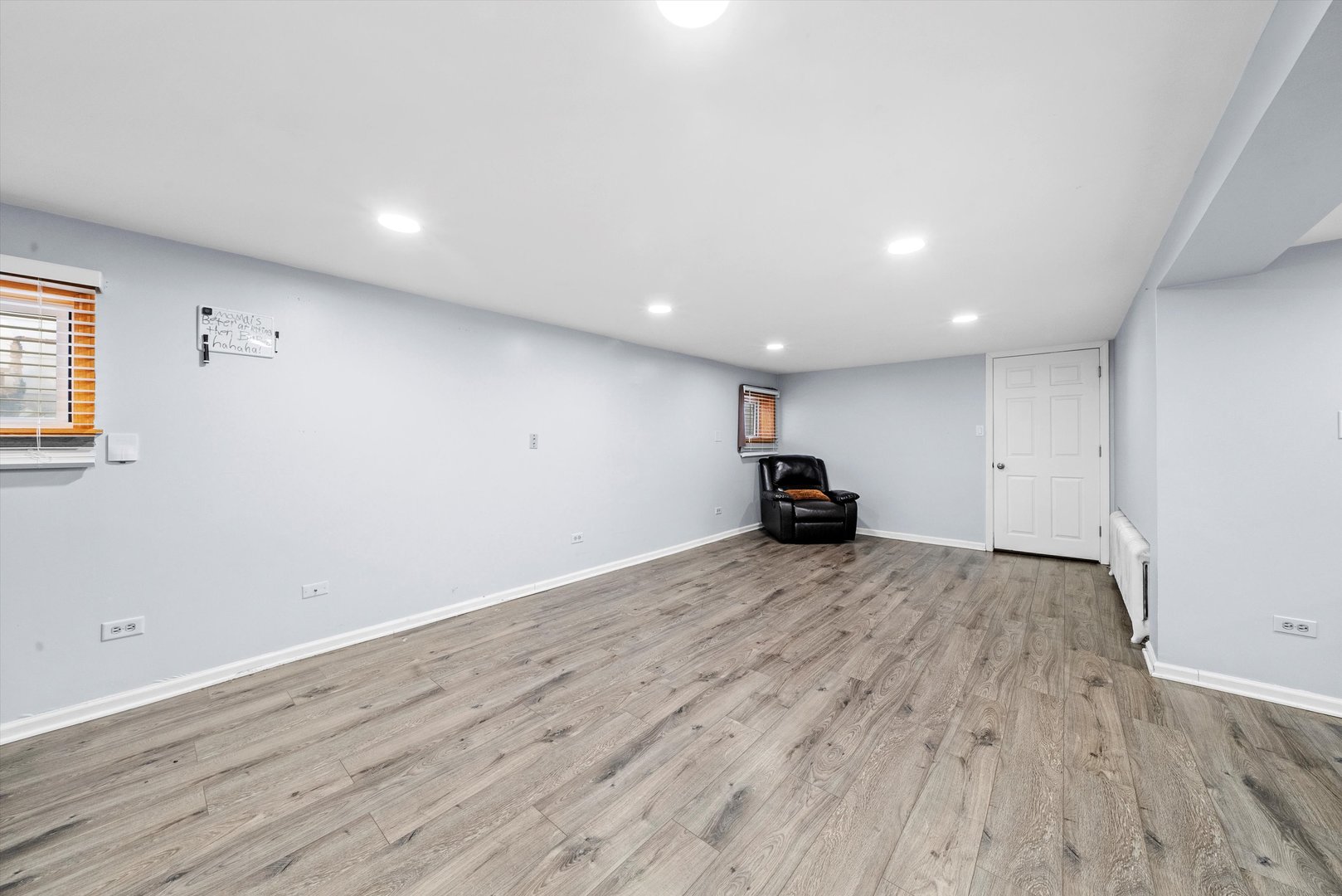 2716 Grove Avenue Berwyn, IL 60402 - Photo 22 of 46 a view of empty room with wooden floor
