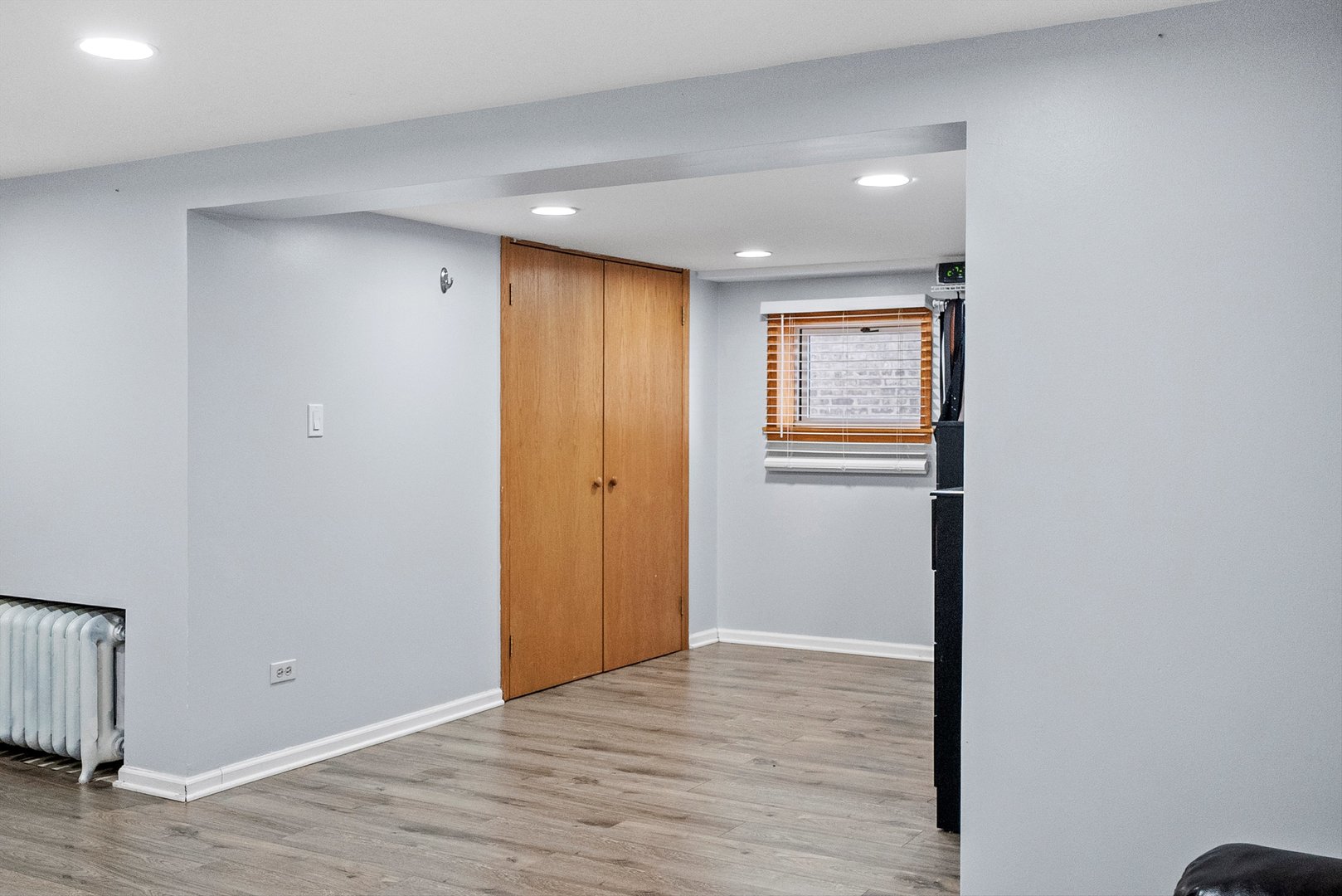 2716 Grove Avenue Berwyn, IL 60402 - Photo 24 of 46 a view of an empty room with wooden floor