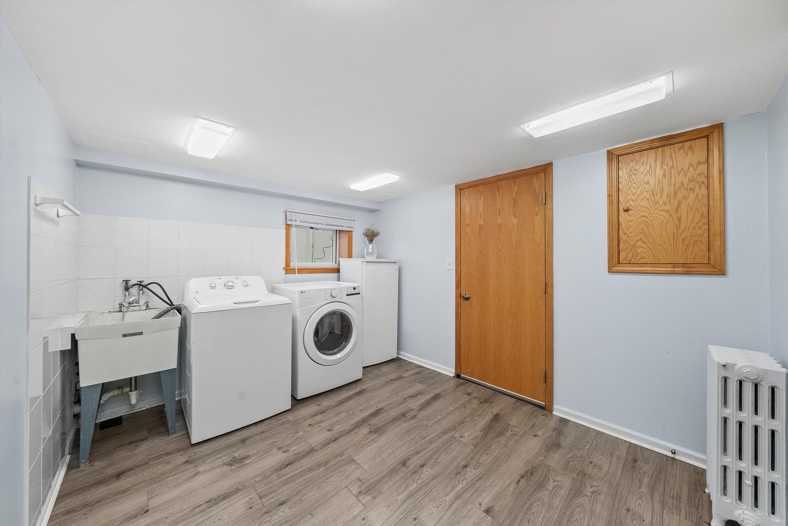 2716 Grove Avenue Berwyn, IL 60402 - Photo 27 of 46 a view of a room with washer and dryer