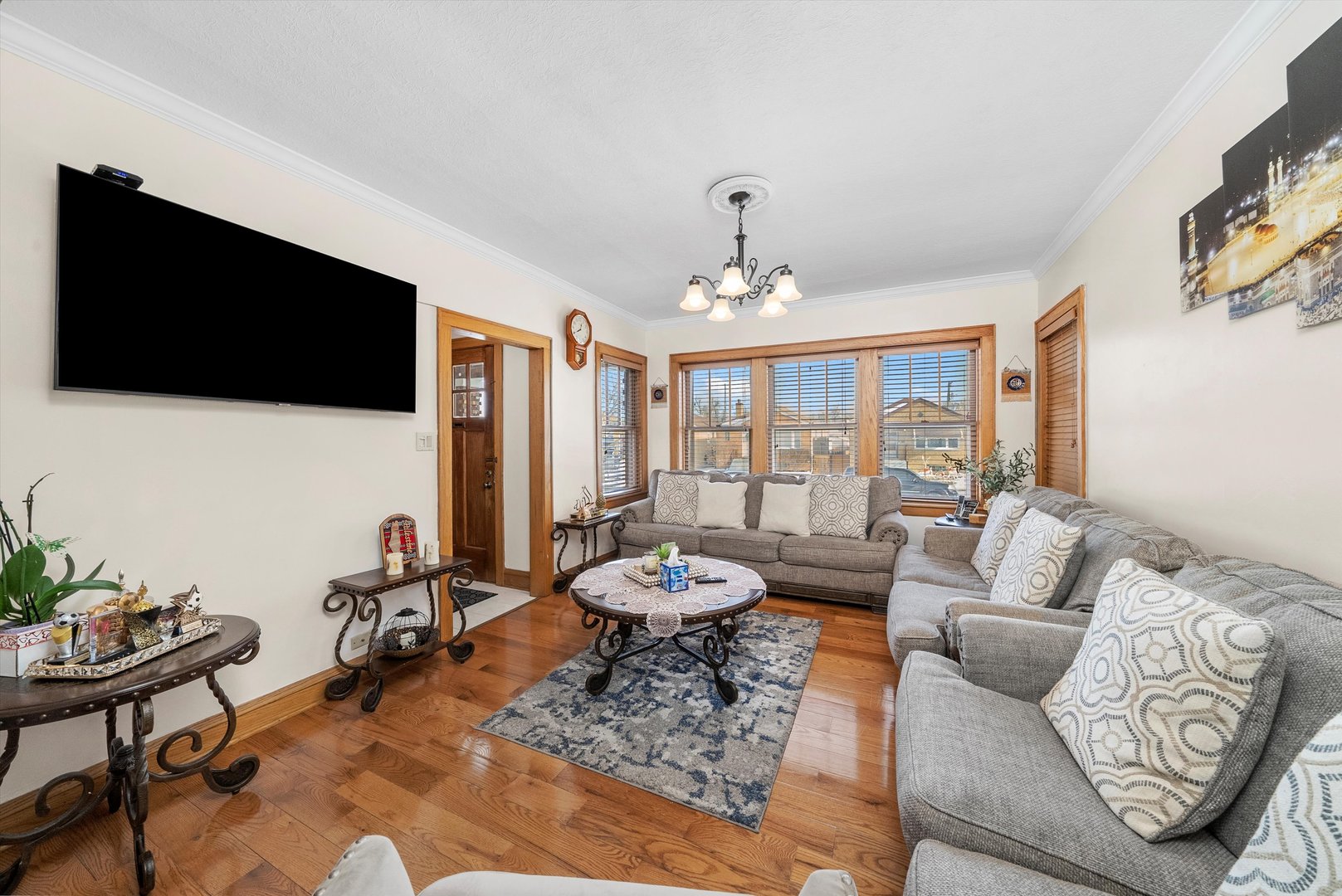2716 Grove Avenue Berwyn, IL 60402 - Photo 5 of 46 a living room with furniture and a flat screen tv