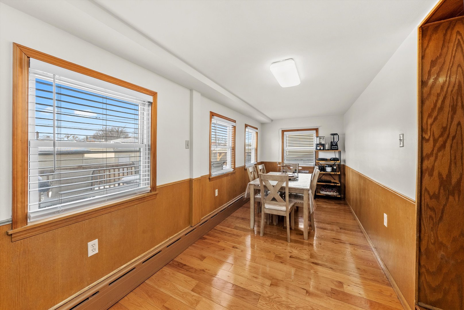 2716 Grove Avenue Berwyn, IL 60402 - Photo 10 of 46 a dining room with furniture and window
