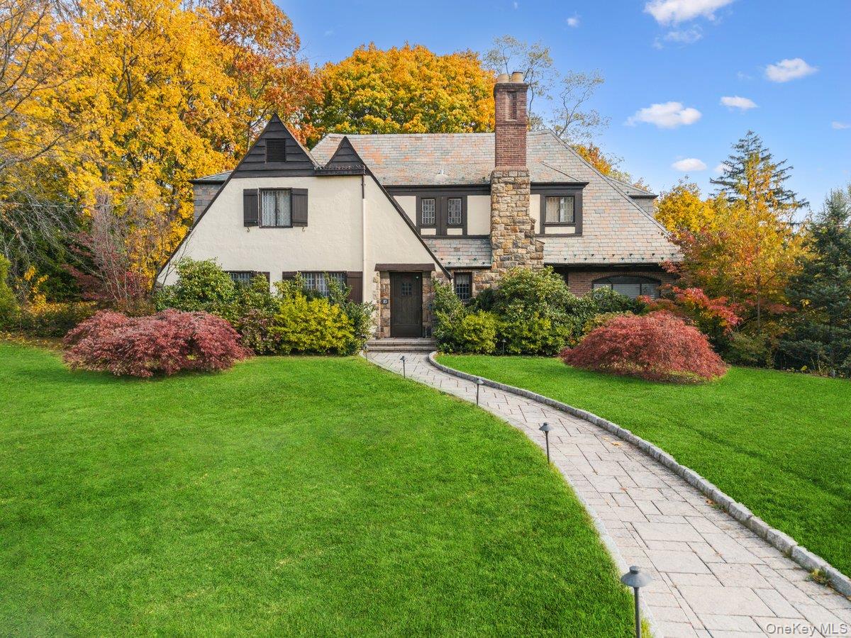 75 Fenimore Road New Rochelle, NY 10804 - Photo 1 of 1 a front view of a house with garden