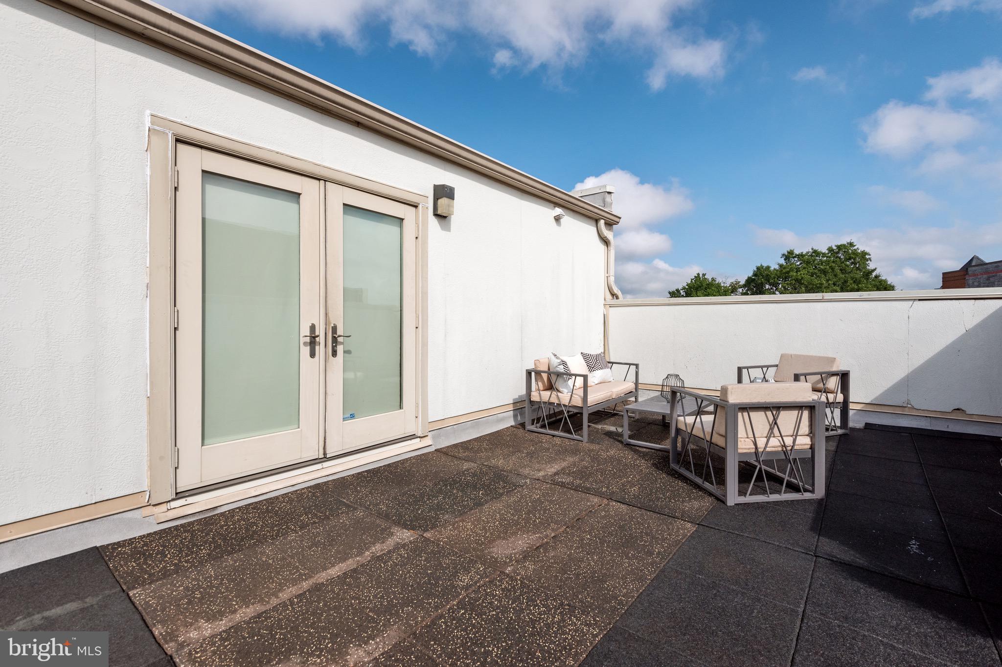 449 R Street Northwest, Unit 301 Washington, DC 20001 - Photo 25 of 29 a view of a balcony with chairs