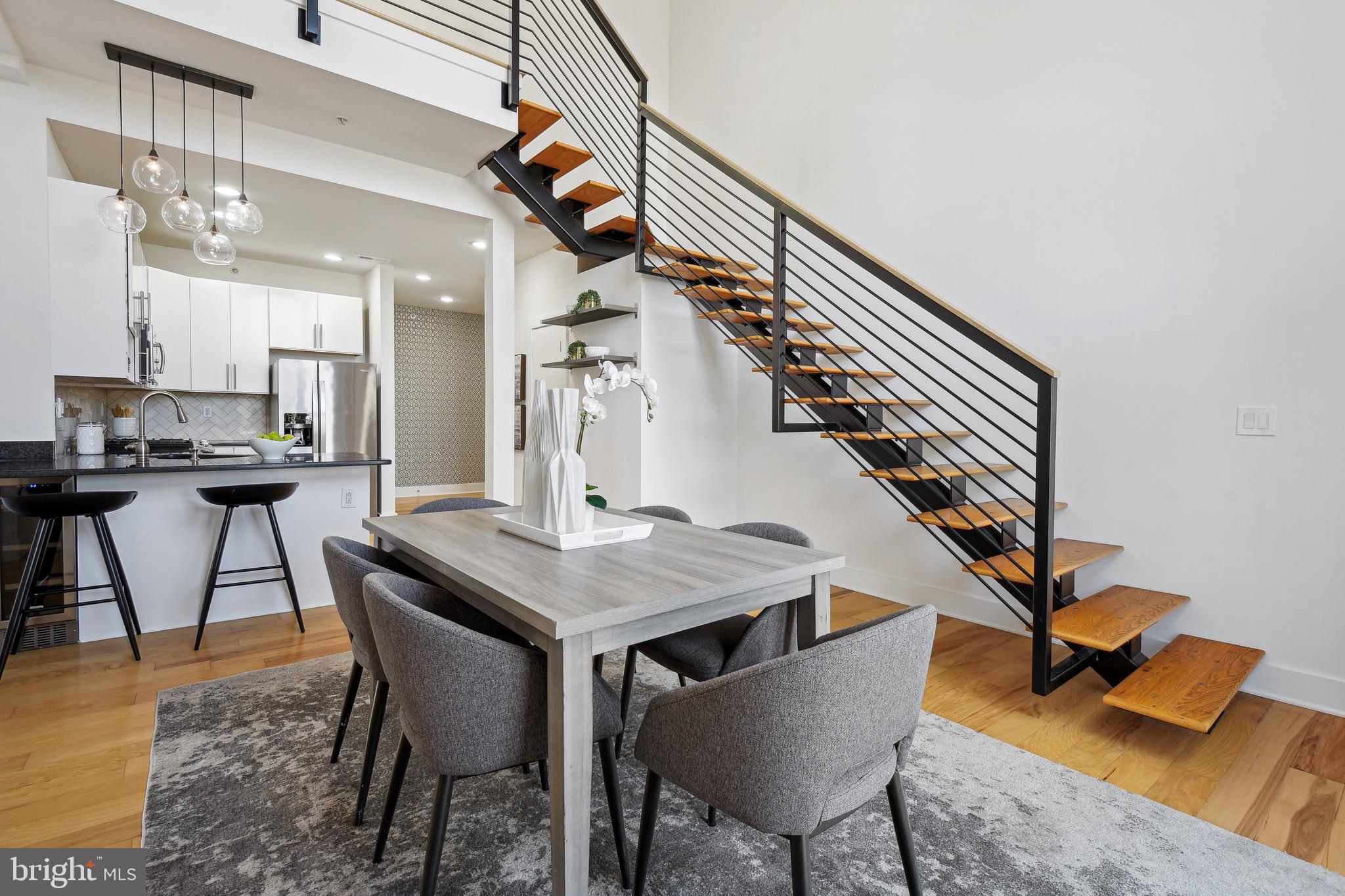 449 R Street Northwest, Unit 301 Washington, DC 20001 - Photo 6 of 29 a view of a livingroom with furniture and wooden floor