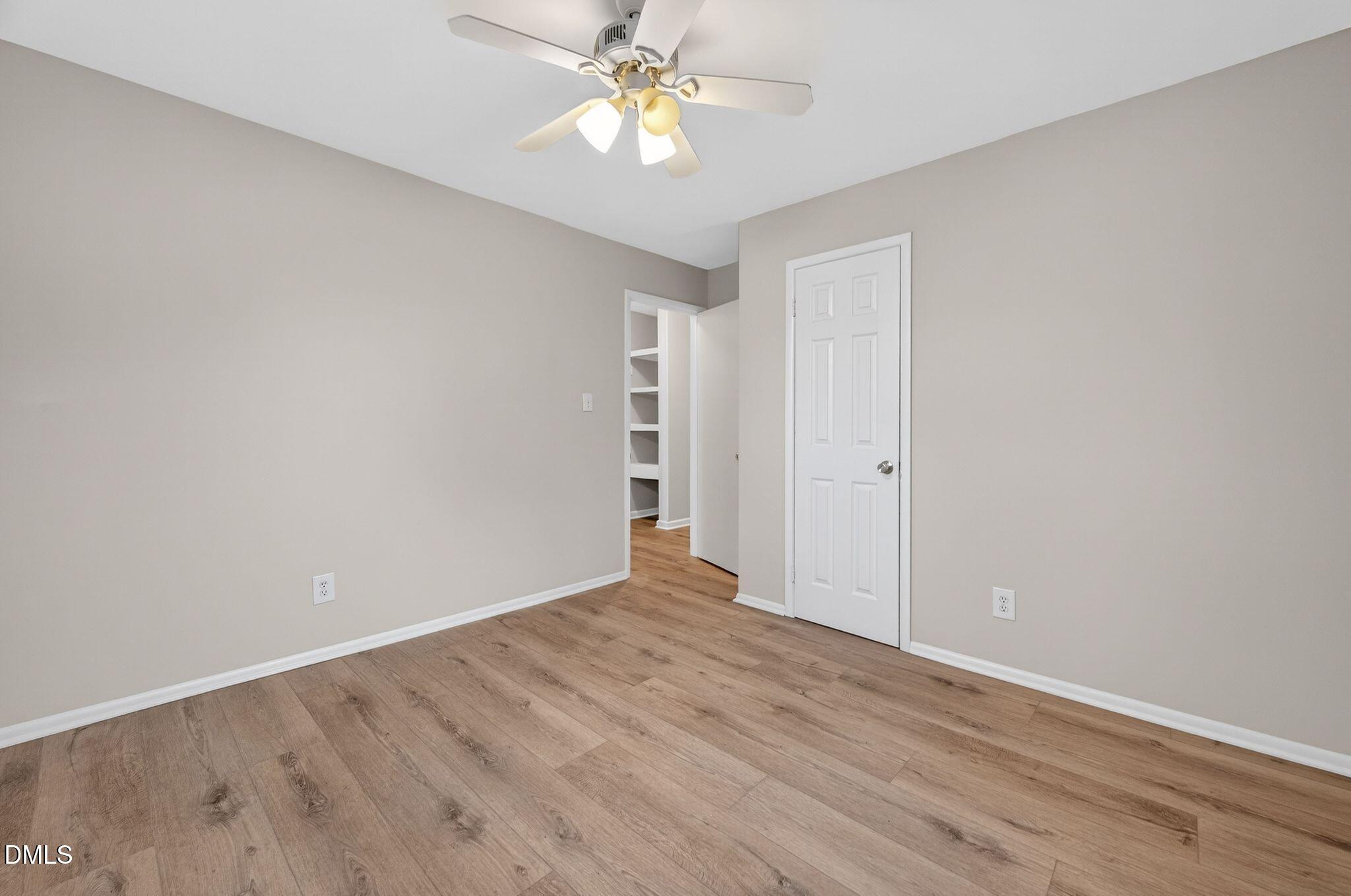 765 Bunche Drive Raleigh, NC 27610 - Photo 19 of 24 wooden floor in an empty room