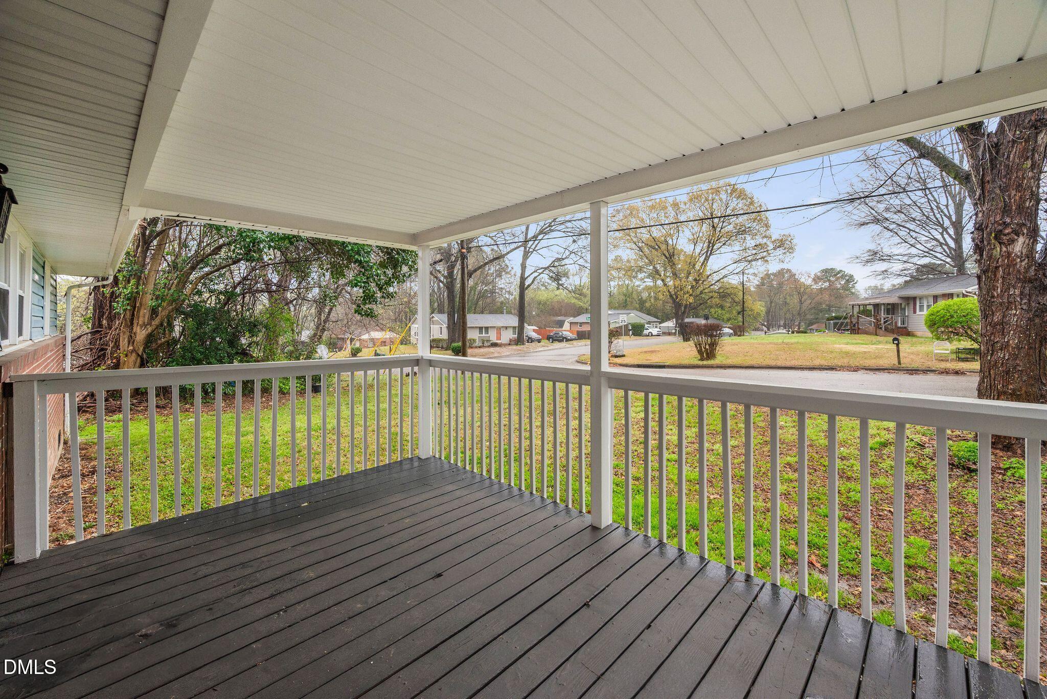 765 Bunche Drive Raleigh, NC 27610 - Photo 3 of 24 a view of balcony with wooden floor