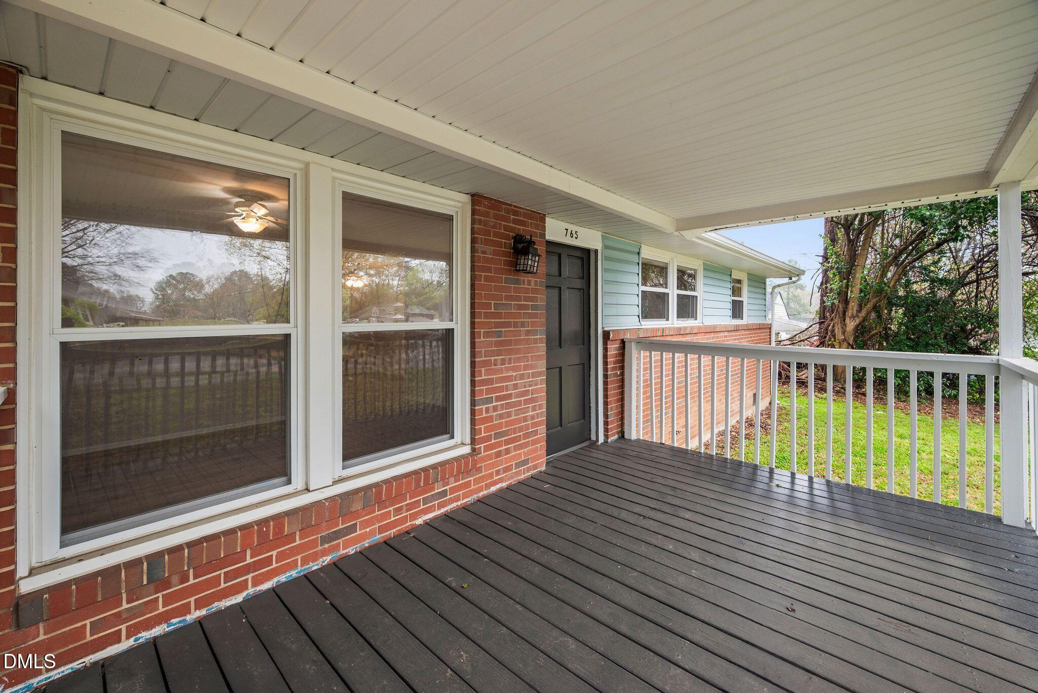 765 Bunche Drive Raleigh, NC 27610 - Photo 6 of 24 a view of a house with a balcony