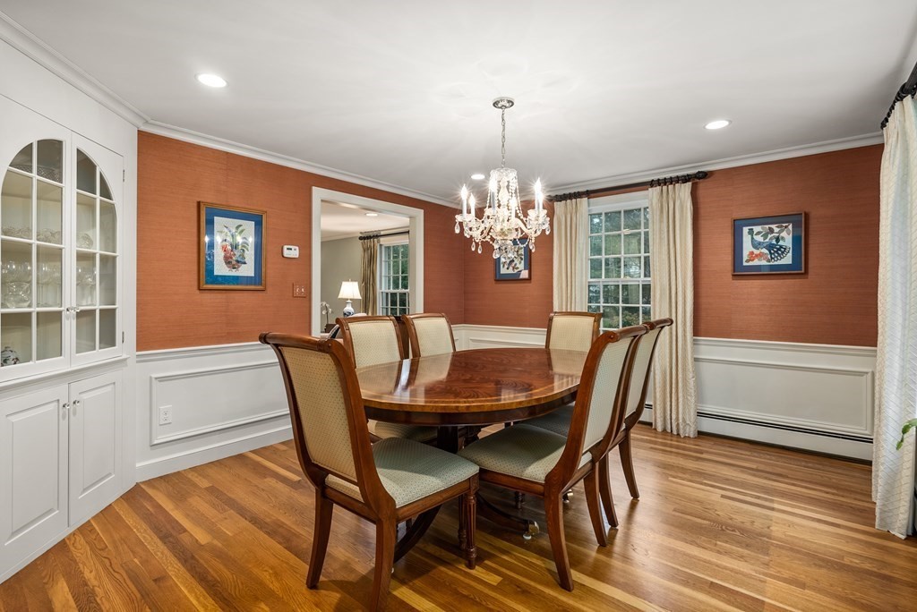 70 Cherry Brook Road Weston, MA 02493 - Photo 13 of 32 a view of a dining room with furniture wooden floor and chandelier