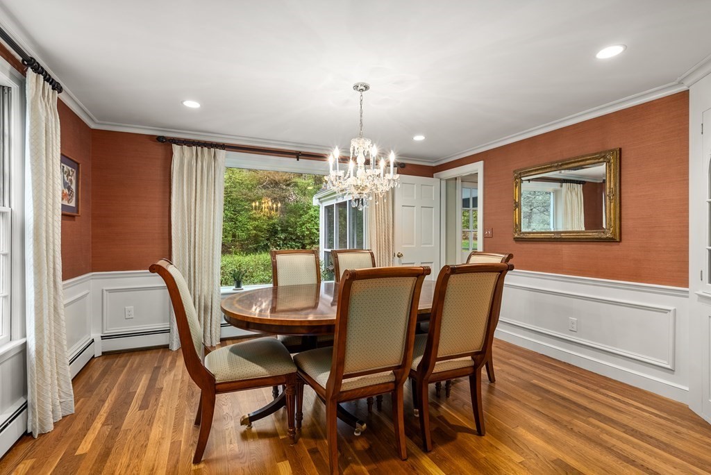70 Cherry Brook Road Weston, MA 02493 - Photo 14 of 32 a view of a dining room with furniture a chandelier and wooden floor