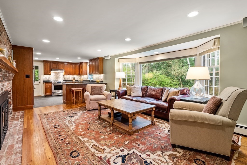 70 Cherry Brook Road Weston, MA 02493 - Photo 15 of 32 a living room with fireplace furniture and a large window