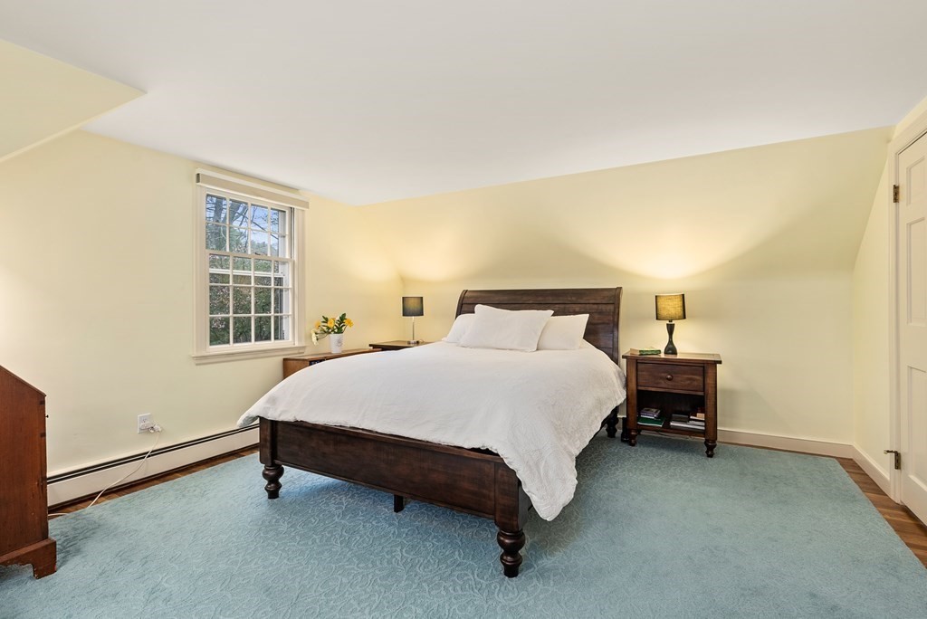 70 Cherry Brook Road Weston, MA 02493 - Photo 22 of 32 a bedroom with a bed and a window