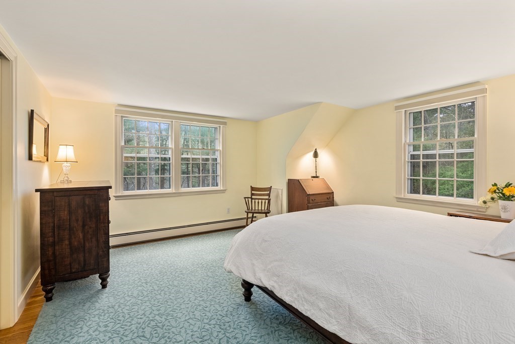 70 Cherry Brook Road Weston, MA 02493 - Photo 23 of 32 a bedroom with a bed and a window