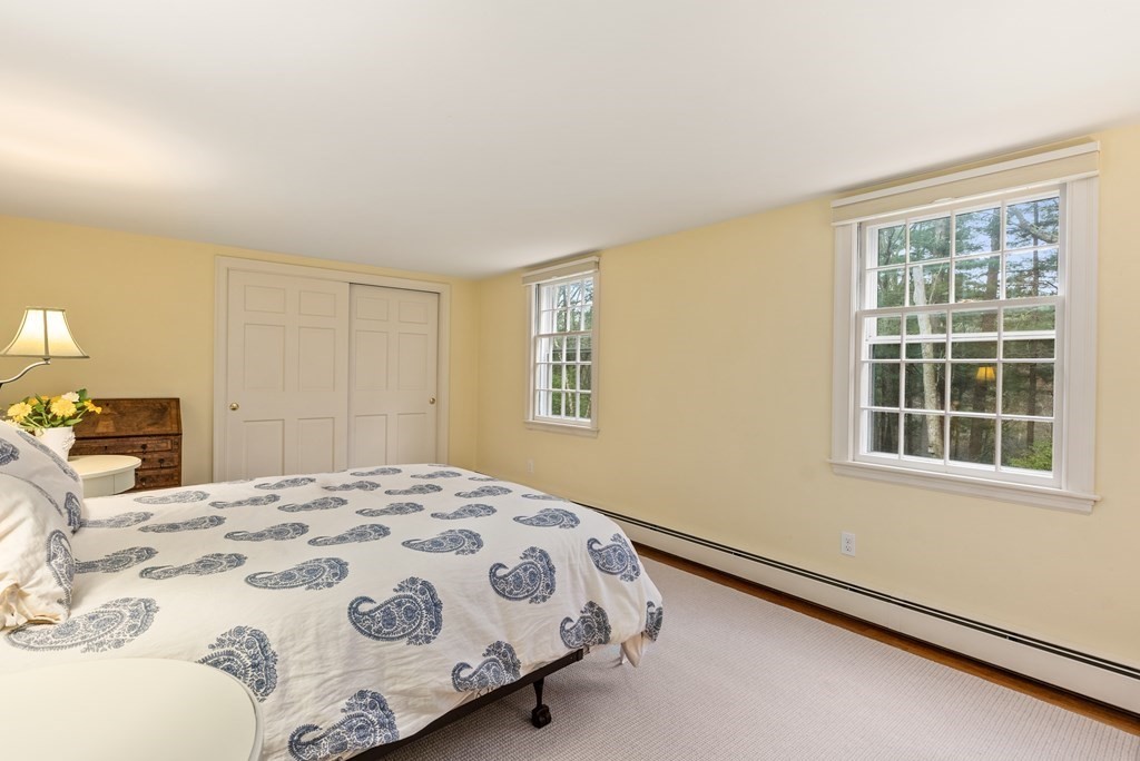 70 Cherry Brook Road Weston, MA 02493 - Photo 25 of 32 a bedroom with a bed and a window