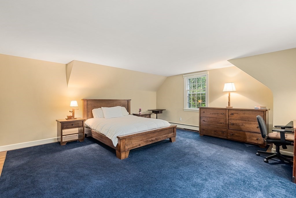 70 Cherry Brook Road Weston, MA 02493 - Photo 27 of 32 a bed room with a bed and a window