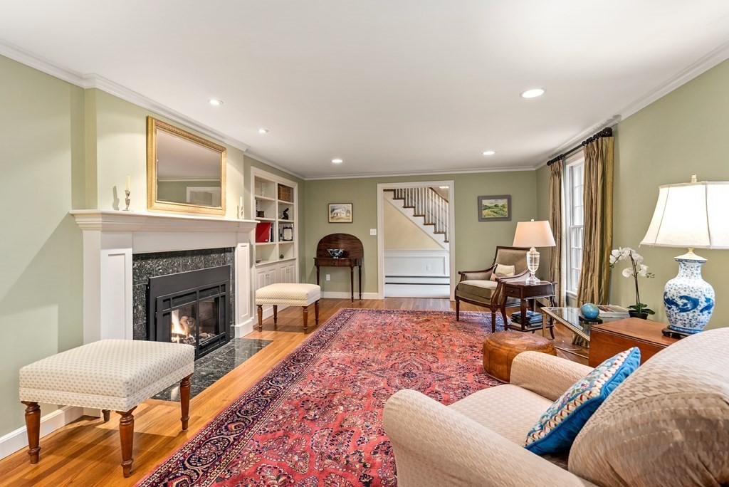 70 Cherry Brook Road Weston, MA 02493 - Photo 5 of 32 a living room with furniture fireplace and window