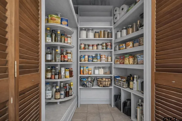a room with a book shelf and a book shelf