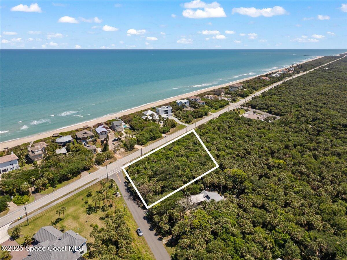 101 Seagrape Road Melbourne Beach, FL 32951 - Photo 2 of 19 02-DJI_00664