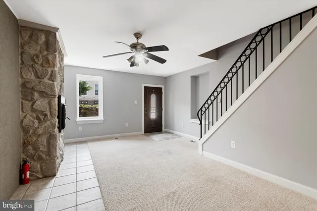 a view of entryway with a front door