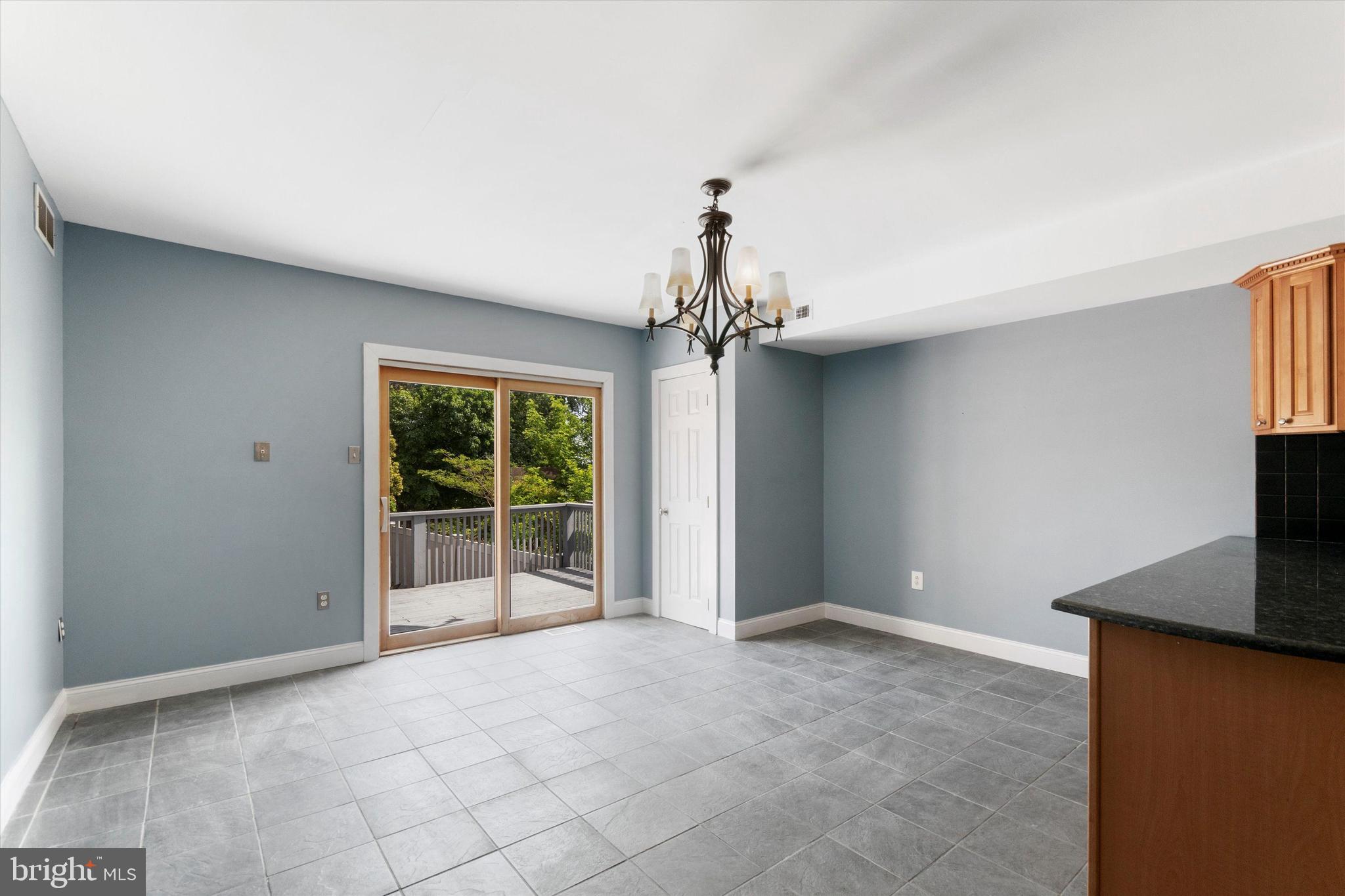 273 Delmar Street Philadelphia, PA 19128 - Photo 15 of 34 a view of an empty room with a window