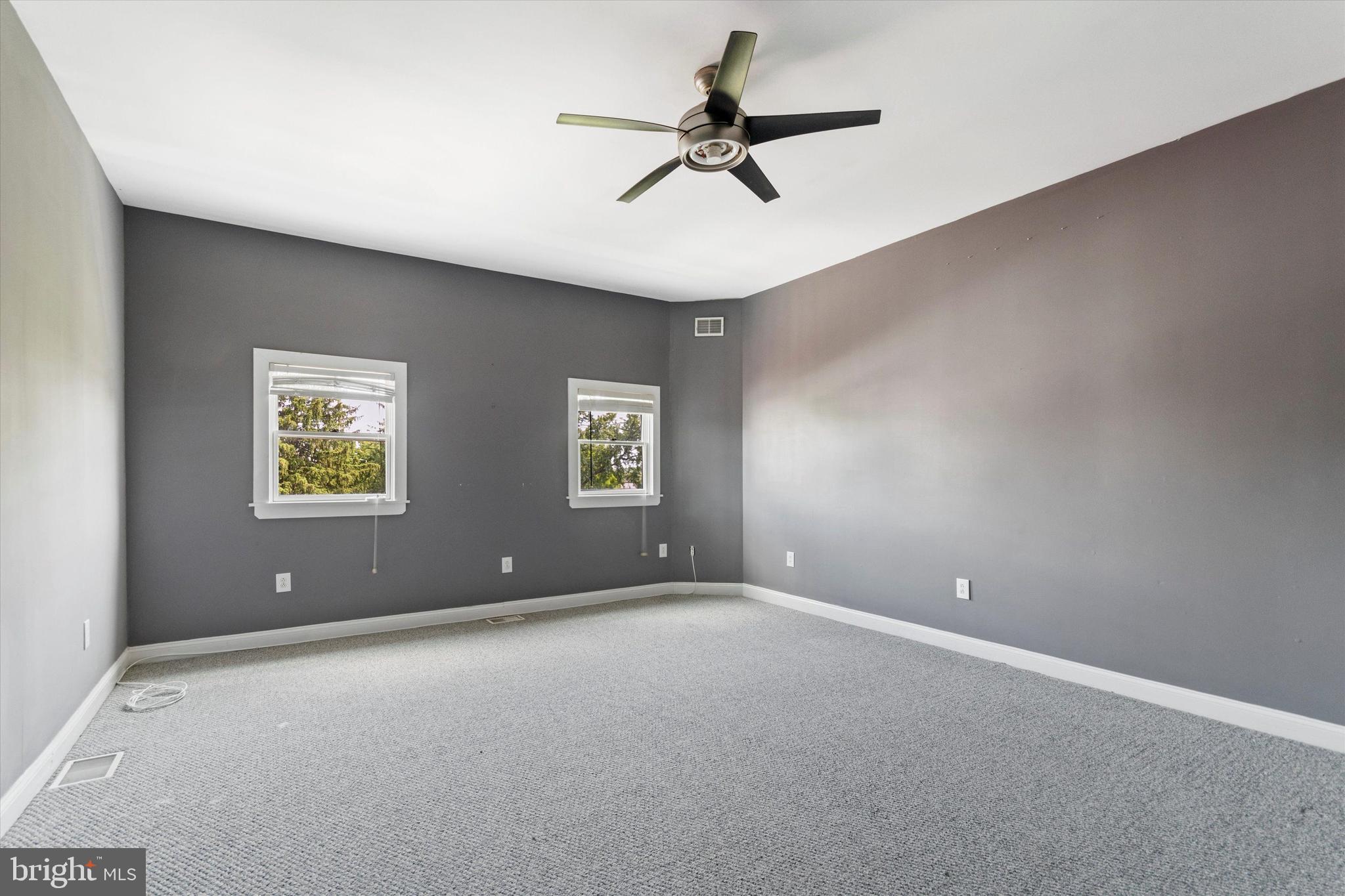 273 Delmar Street Philadelphia, PA 19128 - Photo 22 of 34 a view of an empty room with a window