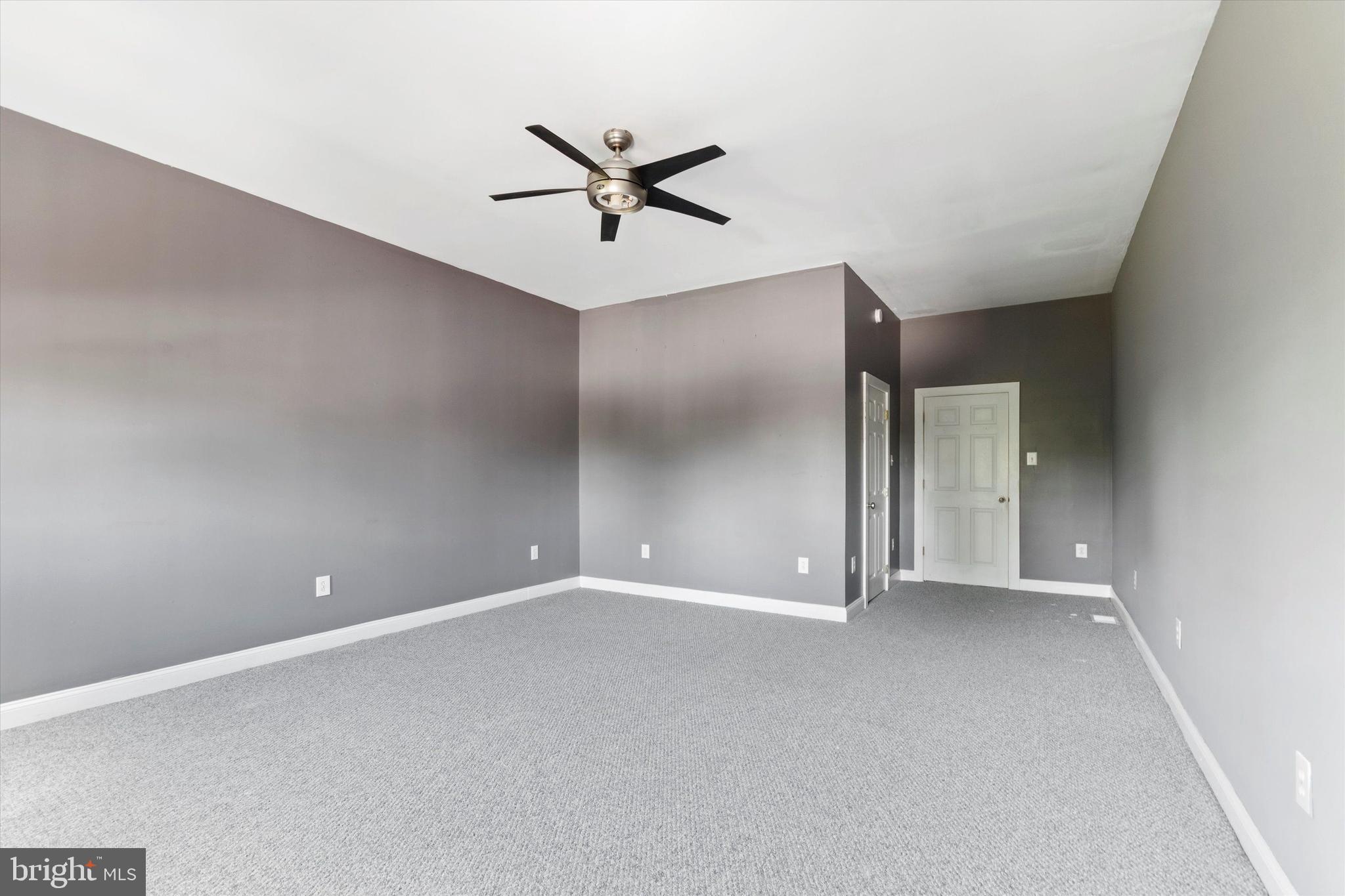 273 Delmar Street Philadelphia, PA 19128 - Photo 23 of 34 a view of a livingroom with a ceiling fan and window