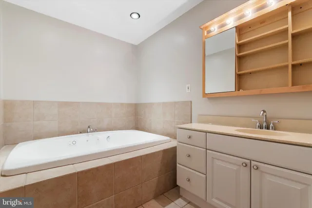 a bathroom with a sink and a bathtub