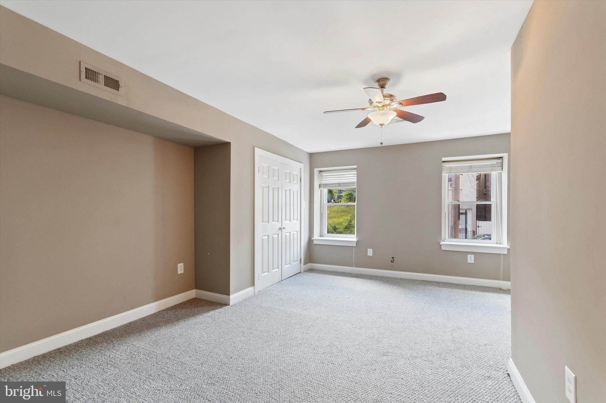 273 Delmar Street Philadelphia, PA 19128 - Photo 29 of 34 a view of an empty room with a window