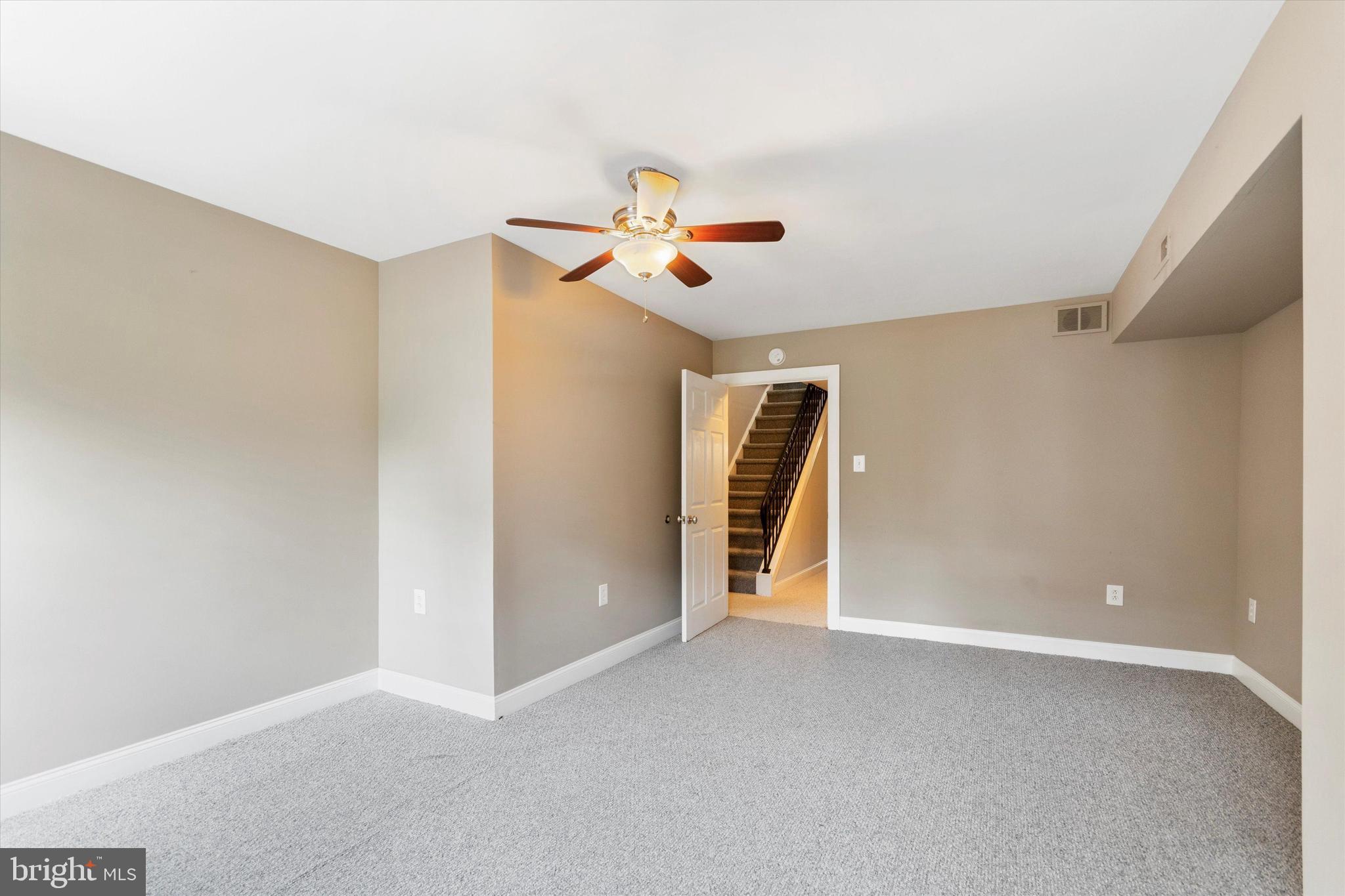 273 Delmar Street Philadelphia, PA 19128 - Photo 30 of 34 a view of an empty room with a ceiling fan
