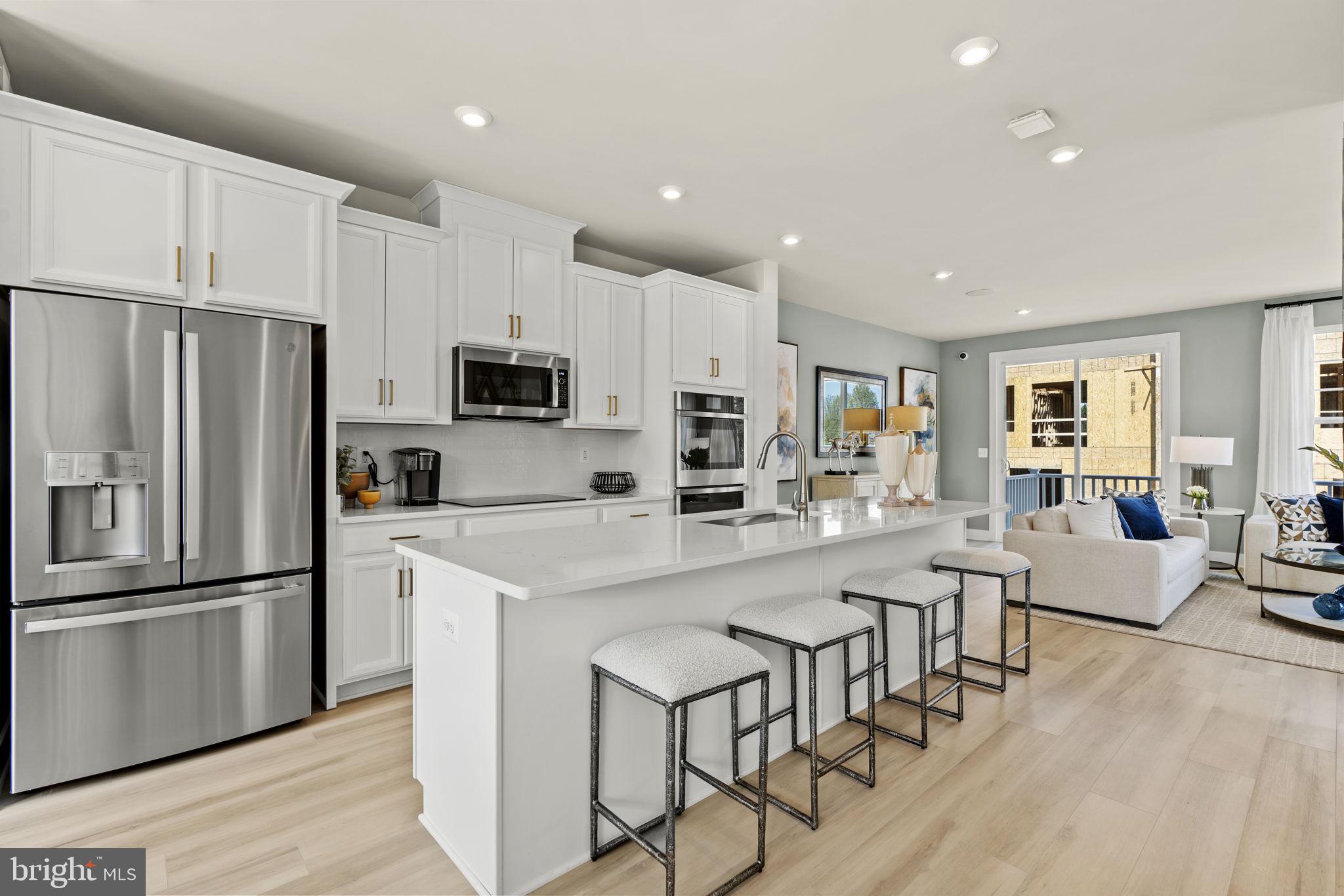 a kitchen with counter space cabinets and stainless steel appliances