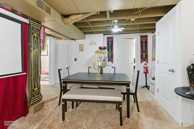 a view of a hallway with seating area